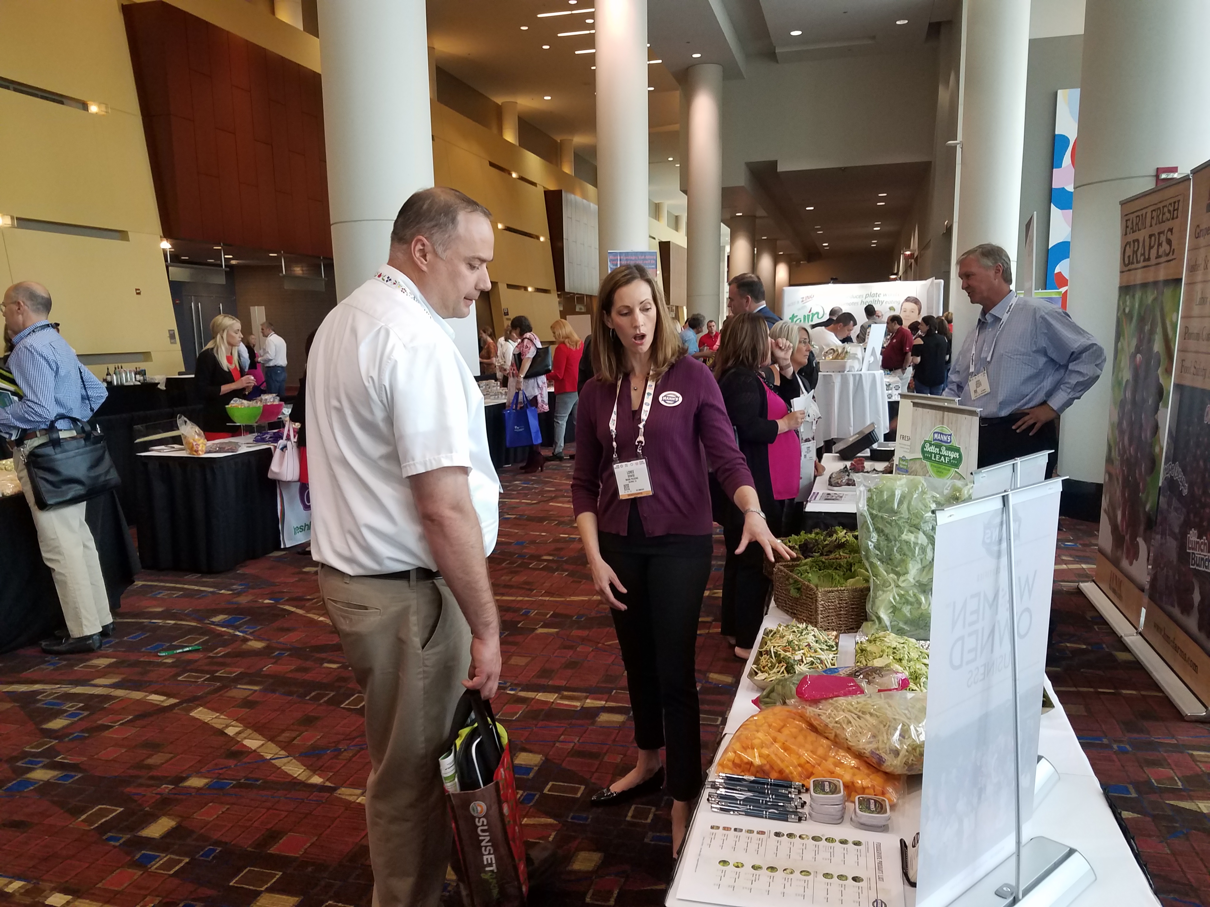 Man looking at produce display